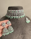 Silver imitation jewellery set with mint green beads including choker necklace and jhumka earrings